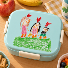 Child’s artwork applied to a pale-aqua lunchbox